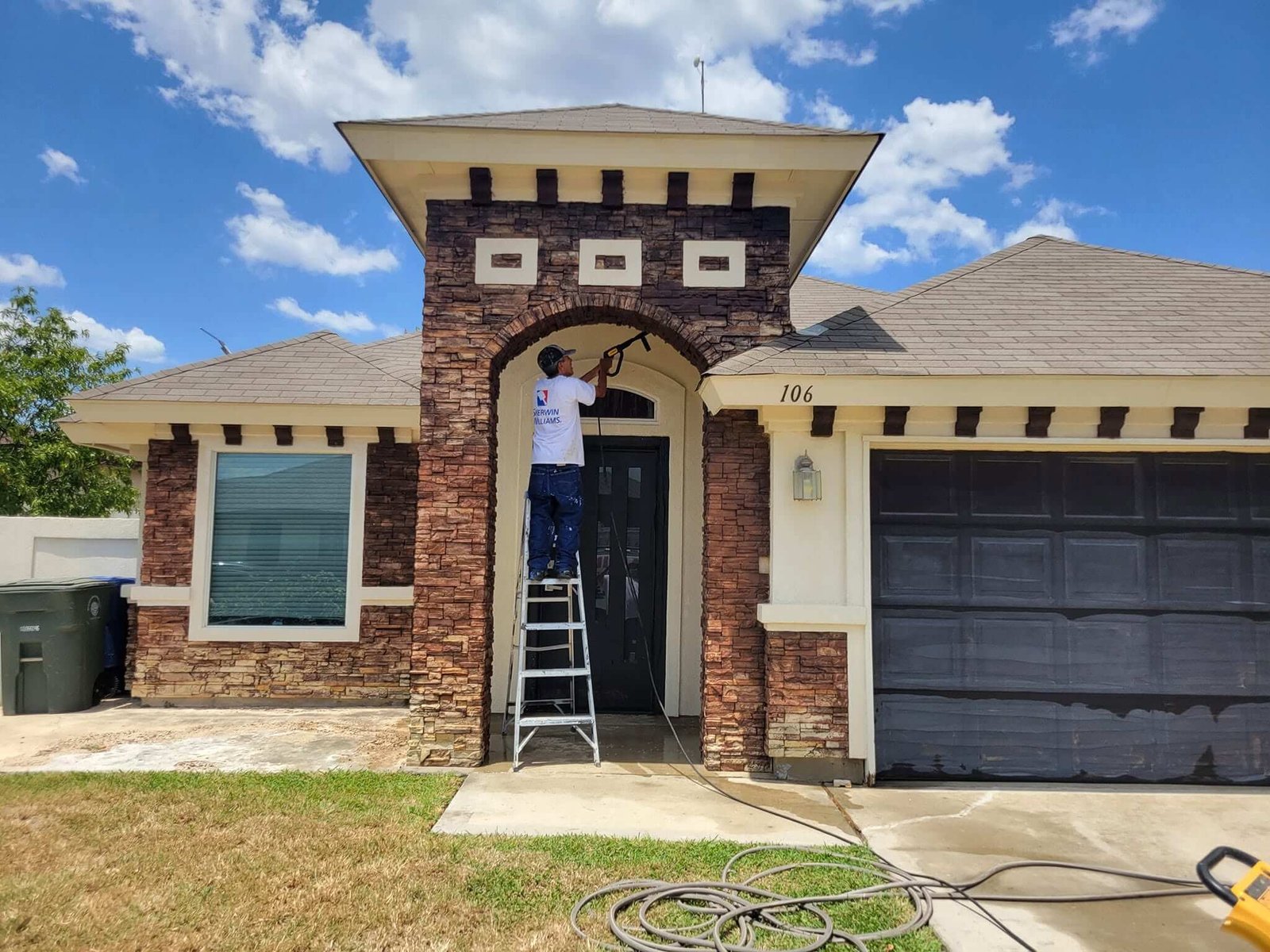 Gray house and garage before exterior painting